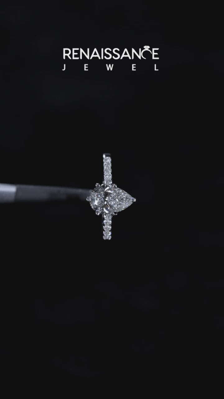 Silver Pear Solitaire Diamond Ring with Pavé Band and Four-Prong Setting 3