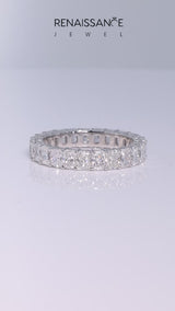 White gold radiant cut diamond eternity band with shared prong setting