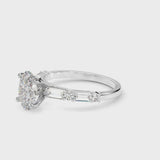 White gold Oval Cut Diamond Solitaire with Side Baguettes and Channel Set Band