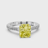 Platinum Fancy Yellow Radiant  Cut Solitaire Diamond Engagement Ring with Pave Band and Four-Prong Setting