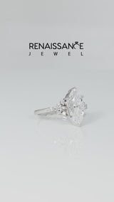 Silver Marquise Cut Moissanite Ring with Side Stones and Four-Prong Setting