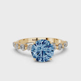Yellow gold Fancy Blue Round Cut Solitaire Diamond Ring with Pave Band and Four-Prong Setting