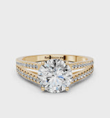 Yellow gold Round Cut Diamond Solitaire Engagement Ring with Split Shank Pavé Band