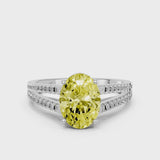 Platinum Fancy Yellow Oval Cut Diamond Solitaire Engagement Ring with Split Shank Pavé Band