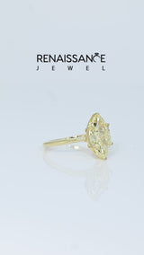 Yellow gold Fancy Yellow Marquise Cut Diamond Solitaire Engagement Ring with Classic Band and Four-Prong Setting