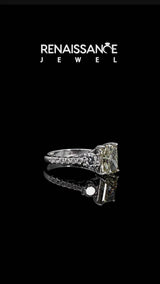White gold Fancy Yellow Radiant  Cut Diamond Three-Stone Ring with Round Side Stones and Pavé Band