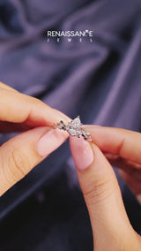 White gold Pear Cut Diamond Solitaire Ring with Twisted Band and Prong Setting