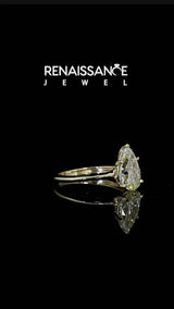 Yellow gold Fancy Yellow Pear Cut Diamond Solitaire Engagement Ring with Classic Band and Four-Prong Setting