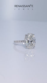 White gold Oval Cut Diamond Solitaire Ring with Round  Pavé Band and Four-Prong Setting