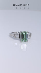 White gold Fancy Green Emerald Cut Diamond Engagement Ring with Baguette Side Stones and Channel Set Band