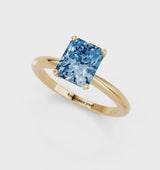Yellow gold Fancy Blue Radiant Cut Diamond Solitaire Ring with Six-Prong Setting and Classic Band