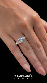 Yellow gold Three-Stone Pear Cut Brilliant Diamond Solitaire Ring with Tapered Band and Four-Prong Setting