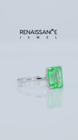 Silver Emerald Cut Green Sapphire Solitaire Engagement Ring with Round Band and Four-Prong Setting