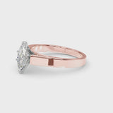 Rose gold Marquise Solitaire Engagement Ring with Four-Prong Setting and Tapered Band