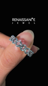 Platinum Oval Cut Aquamarine Eternity Band with Shared Prong Setting