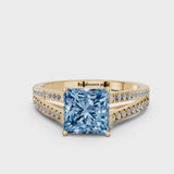 Yellow gold Fancy Blue Princess Cut Diamond Solitaire Engagement Ring with Split Shank Pavé Band