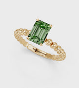 Yellow gold Fancy Green Emerald Cut Diamond Solitaire Ring with Beaded Band and Prong Setting