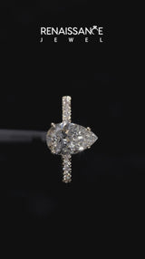 Yellow gold Pear Cut Diamond Solitaire Ring with Round  Pavé Band and Four-Prong Setting