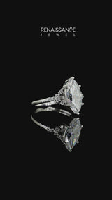 Silver Marquise Cut Moissanite Ring with Side Stones and Four-Prong Setting