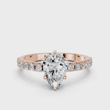 Rose gold Pear Cut Diamond Solitaire Pavé Band with Four-Prong Setting