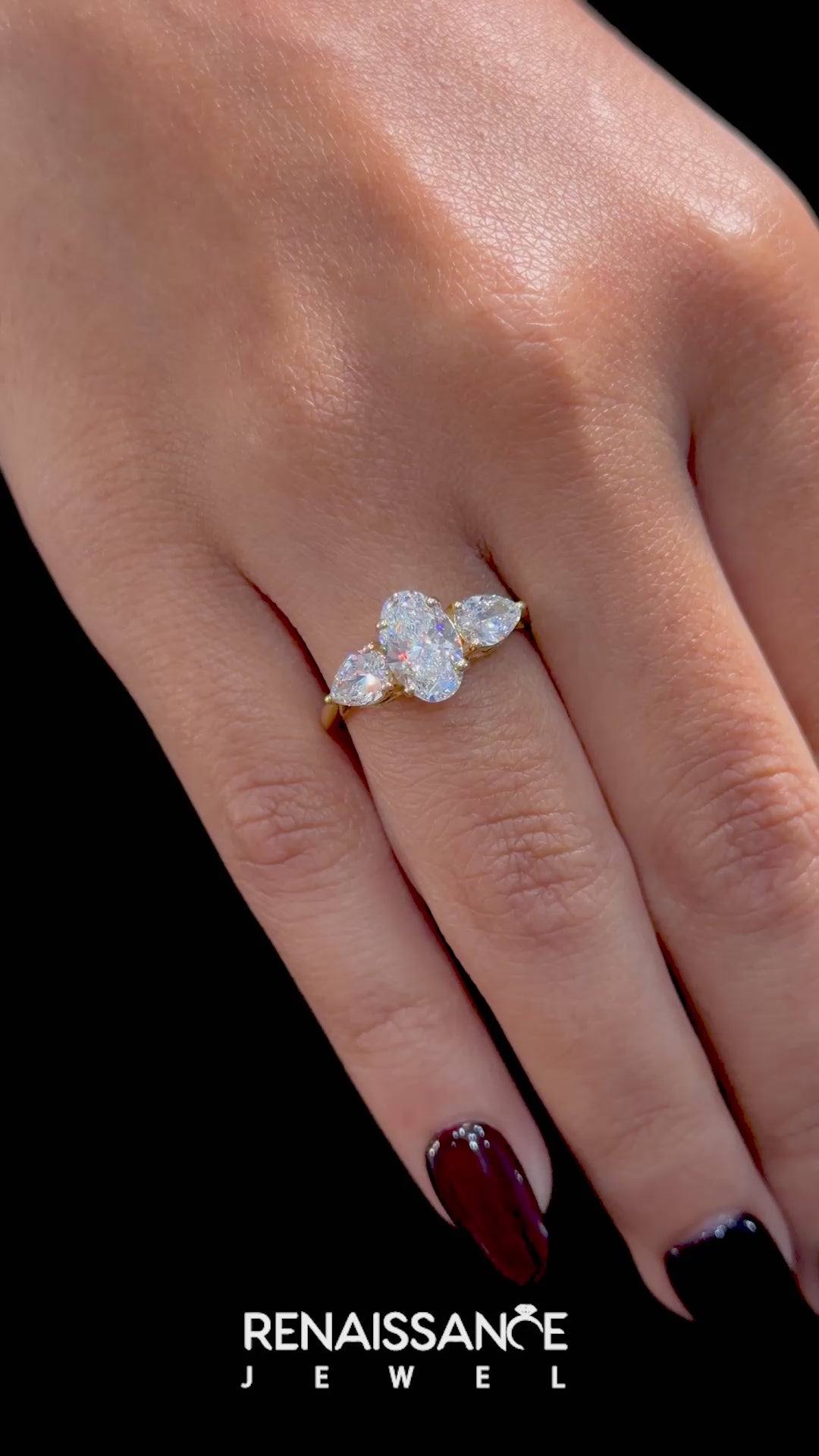 Yellow gold Three-Stone Oval Diamond Solitaire Ring with Pear Side Stones and Four-Prong Setting_23