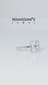 Silver Emerald Cut Aquamarine Solitaire Engagement Ring with Round Band and Four-Prong Setting
