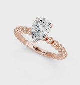 Rose gold Pear Cut Diamond Solitaire Ring with Beaded Band and Prong Setting
