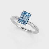 Silver Fancy Blue Emerald Cut Diamond Solitaire Ring with Six-Prong Setting and Classic Band