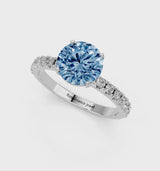Silver Fancy Blue Round Cut Diamond Solitaire Pavé Band with Four-Prong Setting