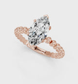Rose gold Marquise Cut Diamond Solitaire Ring with Beaded Band and Prong Setting