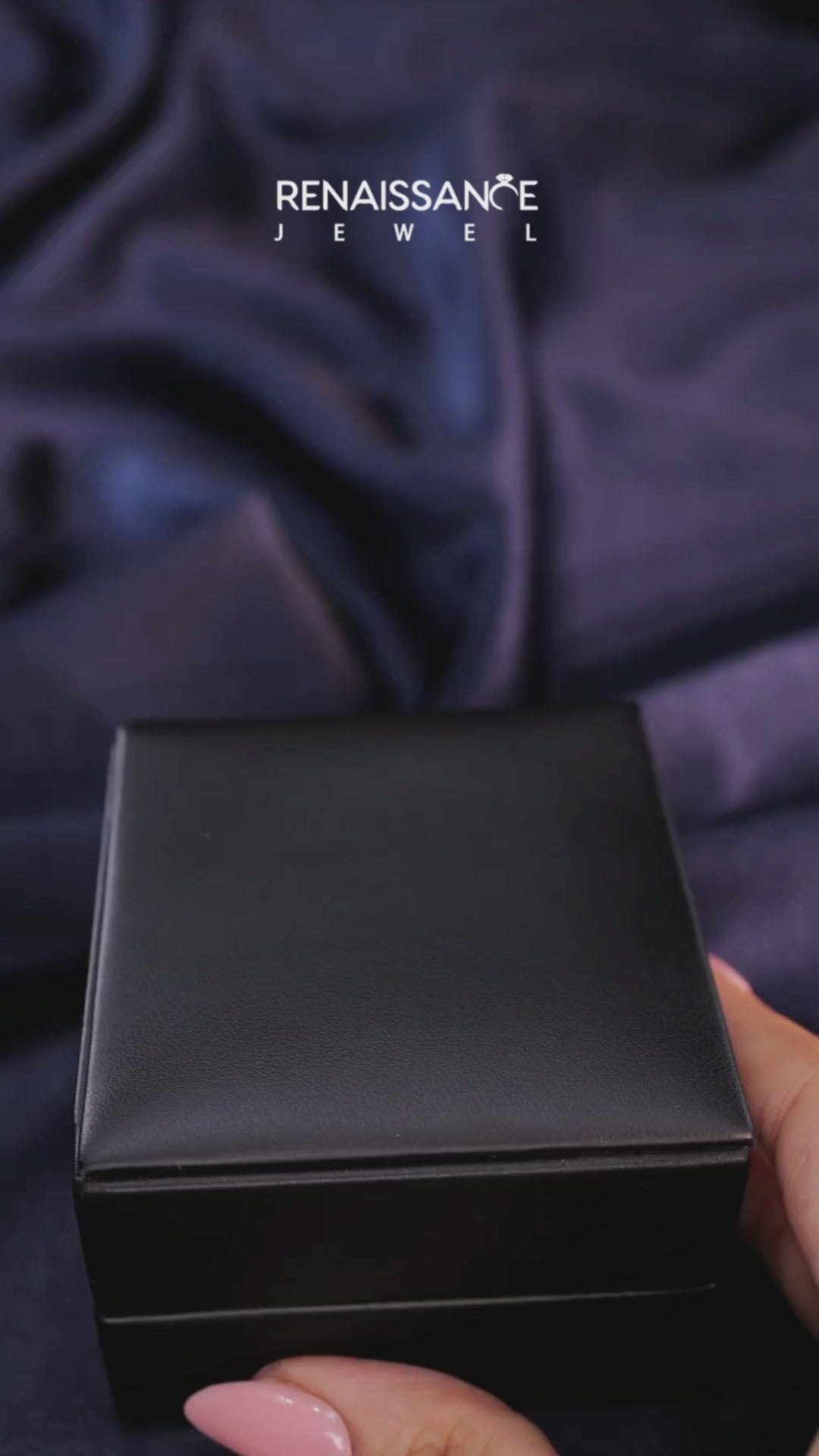 White gold Three-Stone Oval Diamond Ring with Pear Side Stones on a Platinum Band with Four-Prong Setting 4