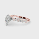 Rose gold Pear Cut Diamond Side Stone Solitaire Ring with Round  and Four-Prong Setting