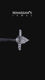 White gold Pear Cut Diamond Solitaire Ring with Twisted Band and Pavé Accents