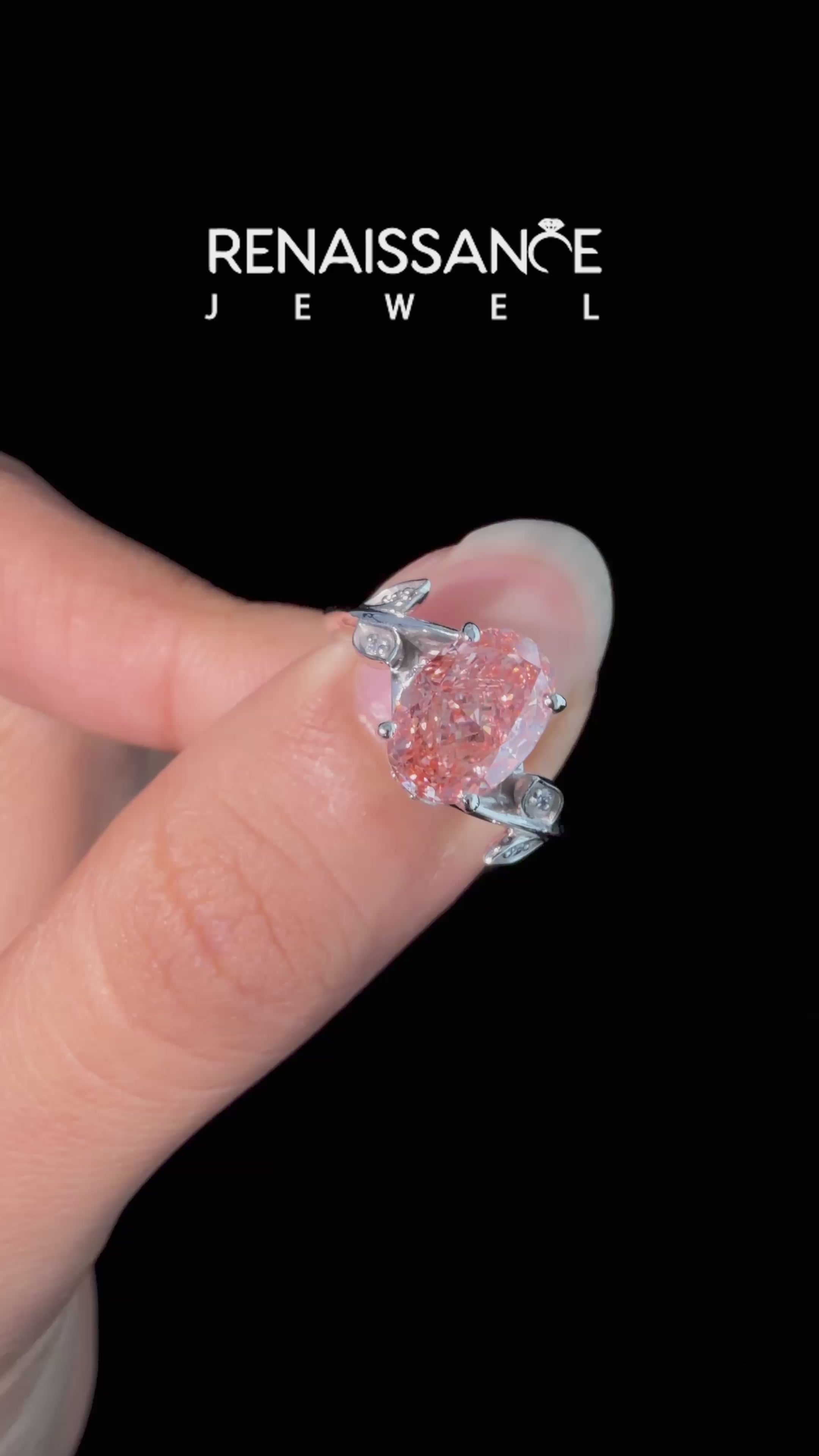 Platinum Fancy Pink Oval Cut Solitaire Twist Engagement Ring with Leaf Accents and Prong Setting_7