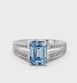 White gold Fancy Blue Emerald Cut Diamond Solitaire Engagement Ring with Split Shank Pavé Band