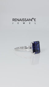 Silver Emerald Cut Blue Sapphire Solitaire Engagement Ring with Round Band and Four-Prong Setting