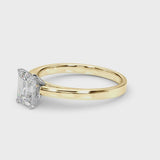 Yellow gold Emerald Solitaire Diamond Ring with Four-Prong Setting and Classic Band