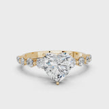 Yellow gold Heart Cut Solitaire Diamond Ring with Pave Band and Four-Prong Setting