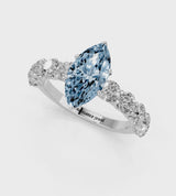 Platinum Fancy Blue Marquise Cut Diamond Prong Setting with Side Stones on a Pave Band