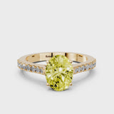Yellow gold Fancy Yellow Oval  Cut Solitaire Diamond Engagement Ring with Pave Band and Four-Prong Setting