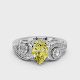 Silver Fancy Yellow Pear Cut Diamond Solitaire Ring with Milgrain Pavé Band and Four-Prong Setting