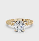Yellow gold Round Cut Diamond Solitaire Ring with Beaded Band and Prong Setting