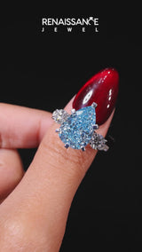 White gold Three-Stone Fancy Blue Pear Cut Diamond Pavé Band with Four-Prong Setting