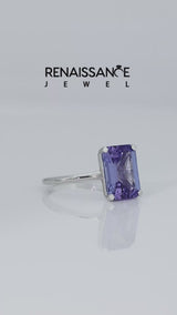 Silver Emerald Cut Tanzanite Solitaire Engagement Ring with Round Band and Four-Prong Setting
