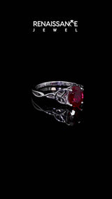 Silver Oval Cut Ruby Solitaire Celtic Knot Ring with Four-Prong Setting