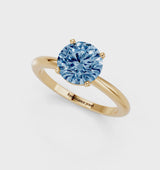 Yellow gold Fancy Blue Round Cut Diamond Solitaire Ring with Six-Prong Setting and Classic Band