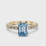 Yellow gold Fancy Blue Emerald Cut Diamond Solitaire Pavé Band with Four-Prong Setting
