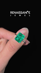 Silver Emerald Cut Emerald Solitaire Engagement Ring with Round Band and Four-Prong Setting