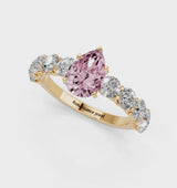 Yellow gold Fancy Pink Pear Cut Diamond Prong Setting with Side Stones on a Pave Band