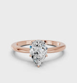 Rose gold Pear Cut Diamond Solitaire Ring with Six-Prong Setting and Classic Band